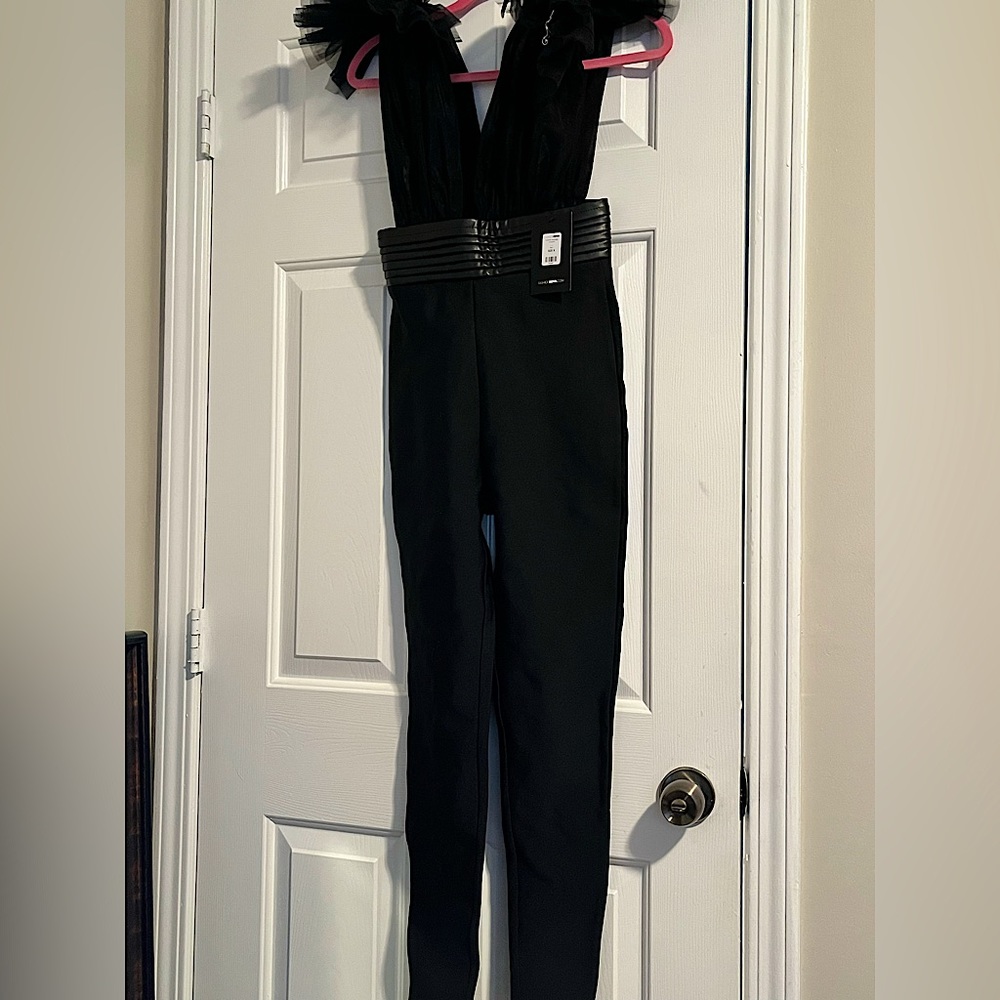 Black jumpsuit with tulle sleeves